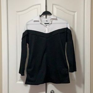 White and black shirt.